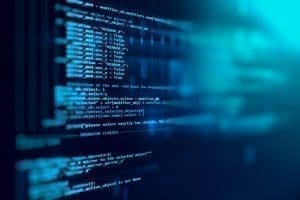 Blue computer screen with line software code