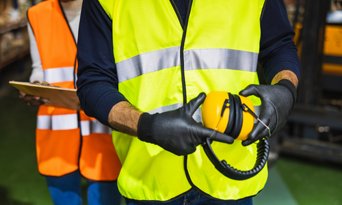 Health and safety professional in a hi vis jacket